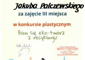 Dyplom dla Kuby za zajęcie III miejsca w konkursie „Baw się eko- twórz z recyklingu”.
